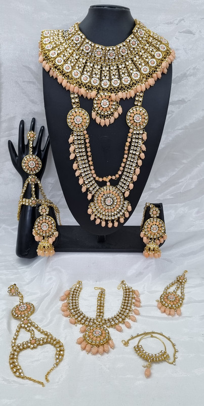 Radiant Contemporary Peach Kundan Choker Necklace Earring Jewellery Set For Bride